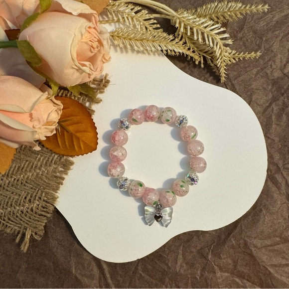 Baby Pink Beaded Bracelet with Bow Charm - Picture 1 of 5